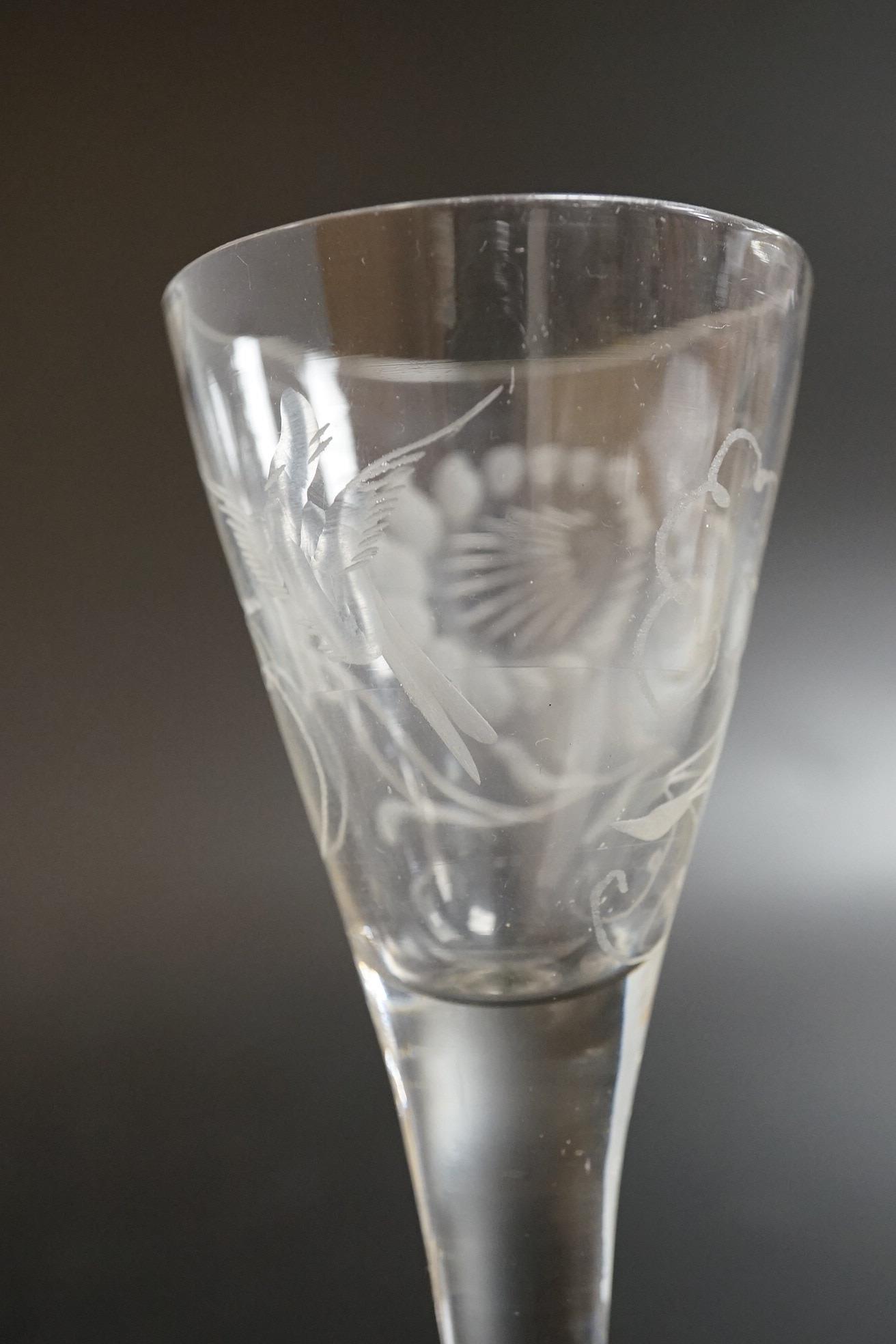 Two George III firing glasses, one with DSOT stem, together with a gin glass with engraved bowl, tallest 11.5cm high (3)